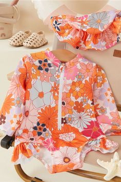 Brighten up beach days with our Floral Kids Swimwear for Girls! This vibrant collection is more than just swimwear; it’s a full ensemble that complements any children’s outfits. Ideal for swimming or simply enjoying the summer sun. Children Outfits, Rash Guard Swimwear, Baby Swimwear, Bath Girls, Designer Jumpsuits, Floral Set, Floral Collection