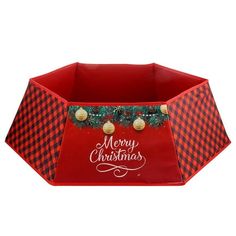 a red and black checkered tray with merry christmas decorations on the bottom, in front of a white background