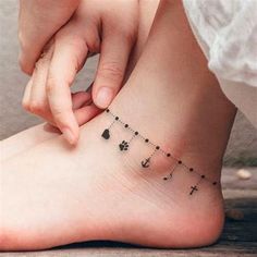 a person with a small tattoo on their foot