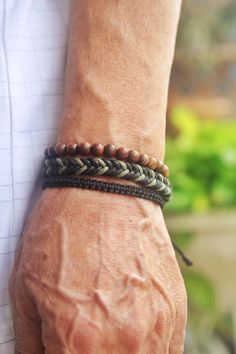 Coconut Bead Bracelet Set- Mens Matching Stackable Bracelets- Yoga Boho Beaded Bracelet Set, Mens Bracelet Set, Bracelet style pack, Handmade bracelets, Beaded bracelets, Surf bracelets, Birthday gift. A combination of 3 handmade bracelets, curated by Alice as the perfect style set for him.  A set of 3 Boho style produced and handmade bracelets. Featuring Coconut Bead, this bracelet stack includes handmade hemp rope braided. Male Bracelets Diy, Purvida Bracelets, Boho Accesories, Surf Bracelets, Mens Bracelet Diy, Mens Bracelet Set, Masculine Jewelry, Bohemian Style Men, Mens Jewerly