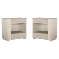 two white nightstands side by side against a white background