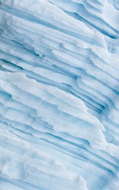 an iceberg is shown in the middle of winter