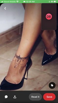 a woman's foot with a tattoo on it