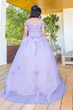 Your sweet girl will make a grand entrance in this floral and butterfly applique long off the shoulder cape sleeve dress with A-line skirt by Cinderella Couture 8075. This beautiful ballgown features an off shoulder sweetheart bodice embellished with butterfly appliques, cape sleeves, open lace-up back with a zipper closure, and a floor length A-line skirt with a sweep train. Matching women's dress sold separately: Style 8075J. Girls Butterfly Cape Sleeve Gown by Cinderella Couture 8075 Designer: Bliss by Cinderella Couture Fabric: Glitter Tulle, Butterfly Appliques, Floral Embroidery, Beaded Embellishments, Polyester Please note: There may be a loss of glitter while wearing this dress due to the nature of the fabric Colors: Sage Green, Lilac, Blush Pink Sizes: 2, 4, 6, 8, 10, 12, 14, 16 O Floral Applique Ball Gown Dresses, Spring Tulle Ball Gown, Fitted Off-shoulder Dress For Pageant, Fitted Off-shoulder Dress For Pageants, Pageant Ball Gown, Cape Sleeve Dress, Butterfly Applique, Shoulder Cape, Quince Dress