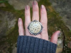 This ring is one of a kind, fabricated in my home studio of sterling and fine silver.  SIZE: 7.75 US GEMSTONES: Fossilized Coral  METAL: Sterling and fine silver Please message me if you have any questions. Thanks for shopping in my little storefront!  -Farrah, silversmith and owner of Arachne Jewels  **I will do all I can to ensure your package arrives on time, I am not responsible for shipping delays caused by carriers or natural disasters. Once the package has left my hands, there's nothing I Fossilized Coral Ring, Fossilized Coral, Coral Ring, Fossil Coral, Ring Size 7, Natural Disasters, Fine Silver, Rings Statement, Artisan Jewelry