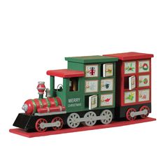 a green and red toy train with pictures on it