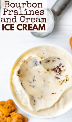 bourbon pralines and cream ice cream in a bowl with cookies on the side