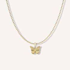 Add some modern romance to your neckline. The Butterfly Necklaces contemporary design with delicate detailing, gets your heart fluttering. Style with your favorite pearls and chains for the ultimate layered look. Created with a sterling silver base and utilizing an extra luxurious 18 karat gold plating for the perfect finish. 16-18" adjustable Removable butterfly pendant 18kt gold plated over stainless steel Elegant Gold-plated Necklace With Butterfly Charm, Elegant Gold Plated Necklace With Butterfly Charm, Elegant 14k Gold Necklace With Butterfly Charm, Elegant Gold Butterfly Necklace With Clavicle Chain, Elegant Yellow Gold Butterfly Necklace With Adjustable Chain, Elegant Gold Necklaces With Butterfly Charm, Elegant Gold Charm Necklace With Butterfly, Elegant Gold Butterfly Pendant Necklace, Dainty Gold-plated Necklace With Butterfly Charm