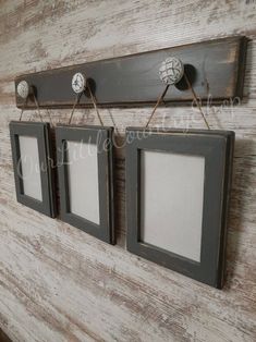 three framed pictures hang on a wall