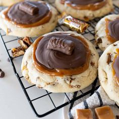 cookies with peanut butter and caramel on a cooling rack, ready to be eaten