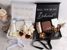 a gift box filled with chocolates and other personal care items next to a bouquet of flowers