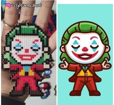 a person holding a key chain in their hand and an image of a clown on the other