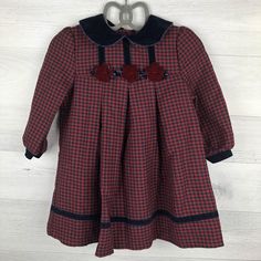 Sweet long sleeve plaid dress with velvet accents. Two button closure on back. Size: 24 months Measurements (approximate): Shoulder to Hem: 19" Armpit to Armpit: 13.5" Brand: Bonnie Baby Condition: Backing on flowers lose on parts Be sure to check out my shop! New items added often! https://www.etsy.com/shop/AutumnRoseArtVintage Long Sleeve Winter School Dress, Plaid Dresses For Fall Holiday, Red Long Sleeve Plaid Dress, Blue Shepherd, Long Sleeve Plaid Dress, Velvet Accents, Maroon Red, Pan Collar, Plaid Dress