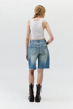 Need-now Abrrand baggy denim jorts in rigid denim with a raw cutoff hem. Features Abrrand baggy denim jorts Longline denim shorts Mid-rise in rigid denim Loose, relaxed fit Long length Zip fly Content + Care 100% Cotton Machine wash Imported Size + Fit Model in Tinted Denim is 5'10.5" and wearing size 27 Measurements taken from size 27 Inseam: 10" | Abrand Jeans Baggy Denim Jort in Tinted Denim, Women's at Urban Outfitters Abrand Jeans, Denim Jorts, Baggy Denim, Long A Line, Long Length, Stretch Denim, Mid Rise, Urban Outfitters, Fitness Models