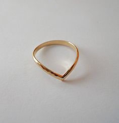 "This is a classic ring and a classic look. It always looks good, whether dressed up or casual. This will be the ring you never take off. This ring is handcrafted from 14k gold filled half round wire. It is hammered to bring out the high gloss shine. I can also make it in rose gold filled, just put a note in the message box when you checkout. ------------------------------ MATERIALS: 14k gold filled --------------------------------- SIZES: US 1-16 Pick your size from the drop down menu or includ Simple Gold Stackable Rings For Formal Occasions, Gold Midi Rings With Simple Design For Formal Occasions, Simple Gold Open Band Ring, Simple Gold Rings For Formal Occasions, V Ring, Casual Frocks, Classic Ring, Stackable Rings, High Gloss