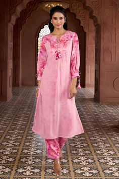 Cherry blossom pink kurta with prints, tassels, coin and sequin work. Comes with matching printed pant. - Aza Fashions Festive Pink Floral Print Palazzo Set, Elegant Pink Palazzo Set With Printed Motifs, Pink Pant Set With Resham Embroidery For Wedding, Pink Floral Print Palazzo Set For Eid, Pink Long Sleeve Sets For Diwali, Pink Floral Print Festive Sets, Festive Pink Floral Print Sets, Pink Unstitched Pant Set For Eid, Pink Floral Print Palazzo Set With Straight Kurta