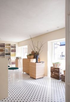 the kitchen is clean and ready to be used as a bar or coffee shop in someone's home