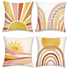 four pillows with different designs on them, one is yellow and the other is orange