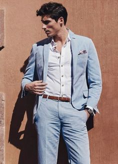 love everything about this: off-color shirt buttons, thin belt, high waisted pants, unstructured blazer Linen Beach Wedding, Summer Wedding Suit, Groom Tuxedo Wedding, Sky Blue Weddings, Beach Wedding Suits, Summer Wedding Suits, Wedding Suit Styles, Wedding Suits For Men, Light Blue Suit