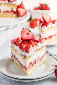 there is a piece of cake with strawberries on it