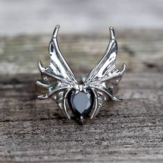 Embrace the darkness with our Dark Bat alloy adjustable ring. This unique accessory features a captivating bat design, crafted with meticulous attention to detail. Embrace The Darkness, Bat Ring, Bat Design, Gothic Ring, Fan Style, Gothic Rings, Attention To Detail, The Darkness, Save Image