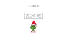 the grinch is wearing a santa hat and green eyes, while he's sitting on