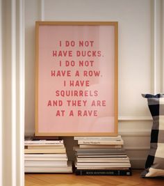 a pink poster with the words i do not have ducks, i do not have a row, i have squirrels and they are at a rave