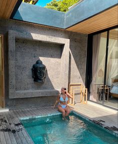 Dark haired girl with tattoos in a white triangle string bikini sitting beside a pool in a beautiful modern Ubud villa Villa Pose Ideas, Exterior House Decor, Womens Tattoo Ideas, House Decor White, Resort Pictures, Ubud Villas, Summer Feed, Villa Exterior