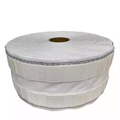 a roll of white toilet paper on a white background