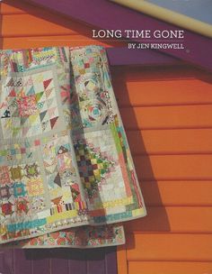 the cover of long time gone by jean kingwell, with an orange building in the background