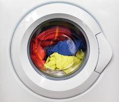 a washing machine with clothes in it