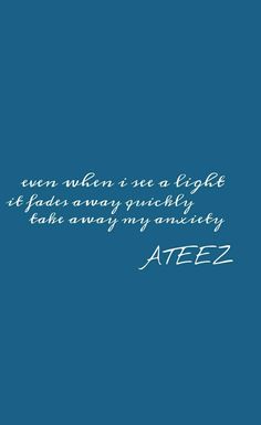 a blue background with the words ateez written in white