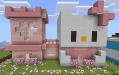 an image of a house that is in minecraft with flowers and grass around it