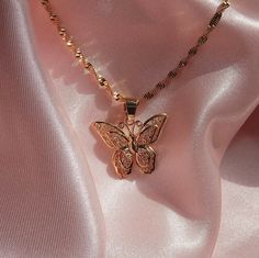 👑🦋 Butterflies are so on trend, and this necklace is no different. Our monarch necklace is perfect for a queen b 🦋👑 ♡ Lead Free ♡ Nickel Free ♡ 24K Gold Filled This necklace measures approximately 17.5 inches with a 3 inch extender chain, totaling for a maximum of 20.5 inches in length. If you'd like a different chain size, please leave a note in your order or message me. Please keep this item free from any moisture or liquids such as water, oil, lotion, perfume, etc. in order to preserve its quality. Do not shower/sleep in the jewelry. Gold Necklace Butterfly, Delicate Gold Necklace, Necklace Butterfly, Pretty Jewelry Necklaces, Earthy Jewelry, Necklace Trendy, Necklace Layering, Butterfly Pendant Necklace, Queen B