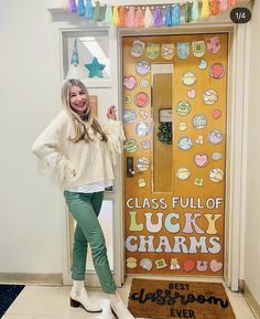 a woman standing in front of a door with the words class full of lucky charms on it