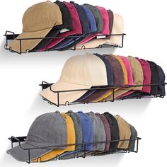 multiple hats are hanging on the wall and in front of each other, one is wearing a hat rack