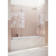 a bath tub sitting next to a shower with a glass door on the back wall