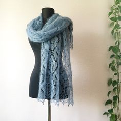 "This blue knitted shawl is very warm, soft and sophisticated. Beautiful handmade wedding mohair wrap for bridal or bridesmaids and as a gift for women.   You can wear it every day and everywhere and combine with any look. Suitable for all seasons, for all life situations, celebrations and special events. Material: Super kid mohair (70 Silk (30%) Color: blue jeans  Dimensions: Width: about 52 cm, 20\"  Length: about 170 cm, 66\" Care Information: Only hand wash in cool water. Use only detergents Elegant Handmade Blue Scarves, Handmade Elegant Mohair Shawl, Elegant Handmade Mohair Shawl, Elegant Hand Knitted Alpaca Shawl, Hand Knitted Alpaca Shawl, Wedding Shawl, Knitted Shawls, Handmade Wedding, Yarn Colors