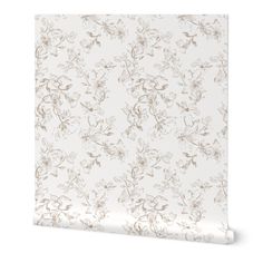 a white wallpaper with flowers on it