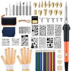 an assortment of crafting supplies including pens, scissors and other items on a white background