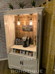 an old fashioned coffee machine is turned into a display cabinet