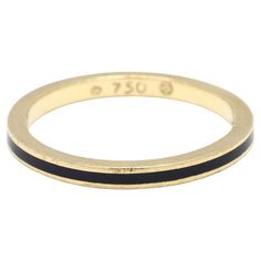 Add a touch of elegance to your jewelry collection with this stunning Hidalgo thin band ring. Crafted from luxurious 18k yellow gold and accented with sleek black enamel, this designer ring offers a chic, modern look perfect for everyday wear or special occasions. Ring Size 6.25 Rise Off Of Finger: 1.5 mm Width: 2 mm Weight: 1.5 mm / 2.3 grams Stamps: "750 HIDALGO" Ring Sizings & Modifications: * We are happy to assist in any ring sizings so that the ring may fit you perfectly upon arrival! - Please click the Ring Sizing listing, adjust the quantity for how many sizes you need to go up or down and add to your cart. For 1/2 sizes, please round down on the quantity. - When you check out, please leave us a note for the specific ring size that you need. We will take care of the rest! - For all Vintage Gold Earrings, 18k Gold Ring, 18k Yellow Gold Ring, Ring Black, Yellow Gold Ring, Enamel Jewelry, Black Enamel, Black Rings, Look Chic