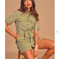 Size L New With Tags Word On The Street Is That The Utilitarian Trend Is Here To Stay And The Lulus Rumor Has It Olive Green Denim Short Sleeve Button-Up Romper Came Prepared! Sturdy Denim, With A Twill-Like Texture, Constructs This Versatile Romper With Cuffed Short Sleeves And A Collared Neckline. Functional Button-Up Bodice Features Twin Top Flap Pockets, An Elasticized Waist With Tying Detail, And Relaxed Shorts With Two Oversized Pockets At Front And Two Flap Pockets At Back. Rolled And Sew Olive Green Romper, Denim Short Jumpsuit, Oversized Pockets, Lulu Shorts, Rumor Has It, Short Sleeve Romper, Denim Short, Green Shorts, Denim Jumpsuit