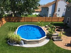 an above ground swimming pool in a backyard