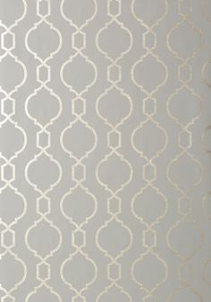 a white and beige wallpaper with an intricate design