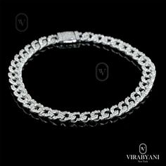 BRACELET INFORMATION: * Metal Type: 14K White Gold * Metal Weight:  11 grams DIAMOND INFORMATION: * Type: Lab-Grown Diamond * Diamond Shapes:  Round * Carat Total Weight: 1.40 ct. * Stone Quantity: 260 * Diamond Color: F * Diamond Clarity: VS --- YOUR ORDER INCLUDES--- ◆ Certificate of authenticity and appraisal stating all jewelry details and retail replacement value. ◆ All items come with a beautiful presentation jewelry box. ◆ Free Insured Shipping (Signature Required) ◆ Free Lifetime Warrant Cuban Link Bracelet, Jewelry Details, Wedding Jewelry Bracelets, Cuban Link, Diamond Color, Wedding Bracelet, Diamond Clarity, Link Bracelets, Diamond Shapes