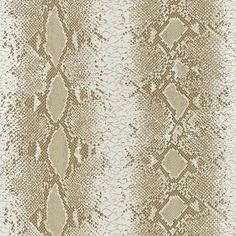 a beige and white snake skin pattern on fabric