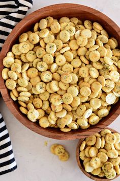 a wooden bowl filled with small pieces of food