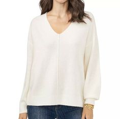 VINCE CAMUTO WOMEN'S V NECK SWEATER SIZE XXL A seasonal essential: the classic V-neck sweater by Vince Camuto, designed with a comfortable fit and seam detail for added dimension. This lightweight V neck sweater is a versatile closet staple. You can pair it with your favorite pair of jeans or a nice midi skirt. - Comfortable Fashion Sweater - Pull Over V Neck Sweater - Lightweight and breathable yarn - V-neck - Ribbing on the cuff and hem - Center seam on the front - Fiber content: 73% Acrylic, Womens White Sweater, Work Sweaters, Hot Pink Sweater, Sweater Cream, Long Sleeve Pullover Sweater, Collar Sweater, Pullover Sweater Women, Antique White, Ribbed Sweater