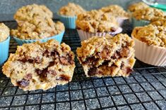 muffins cooling on a wire rack with other muffins